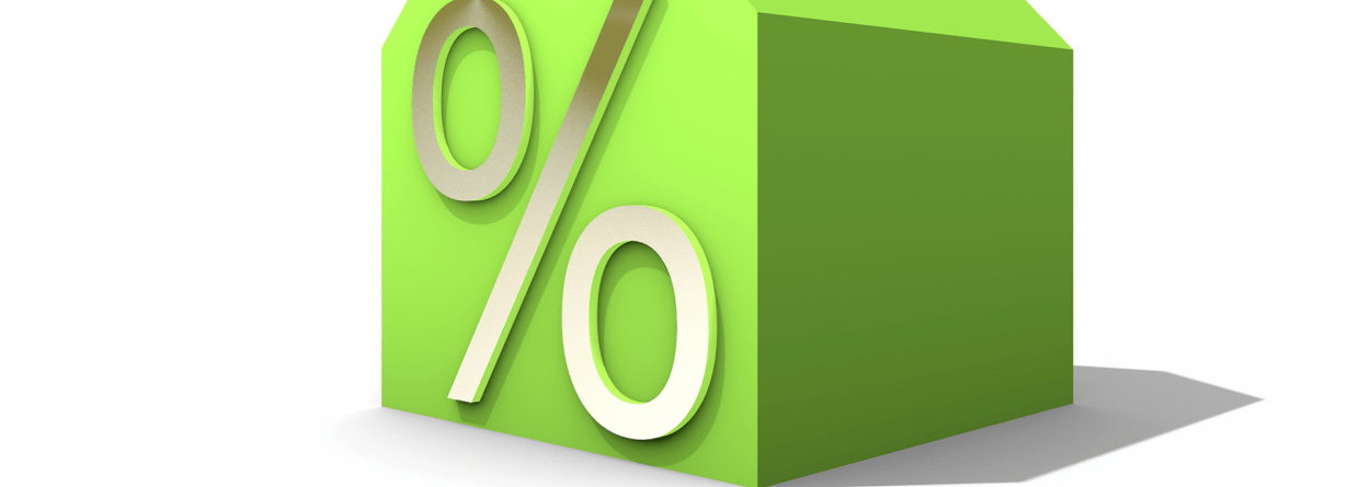 Groen huis met rentepercentage
